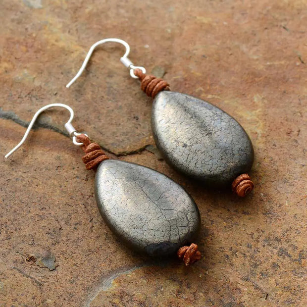 Boucles d'oreilles "Diplomatie" en Pyrite