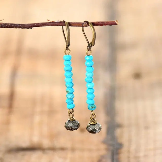 Boucles d'oreilles "Lueur" en Turquoise et Pyrite