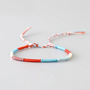 Bracelet Tibétain Tressage Indien Bleu et Rouge