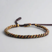 Bracelet Tibétain Tressé Noir et Jaune