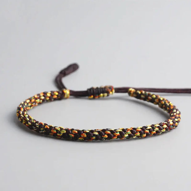 Bracelet Tibétain Tressé Noir et Jaune
