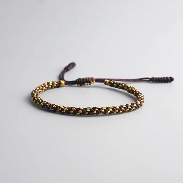 Bracelet Tibétain Tressé Noir et Jaune